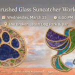 Guests creating crushed glass resin suncatchers during an indoor workshop at The Broken Leash.