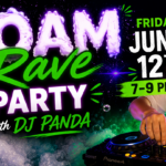Dogs and guests enjoying a foam rave party with DJ Panda at The Broken Leash.