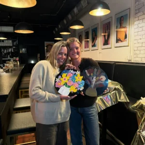 Guests painting recycled vinyl records during an art workshop at The Broken Leash.